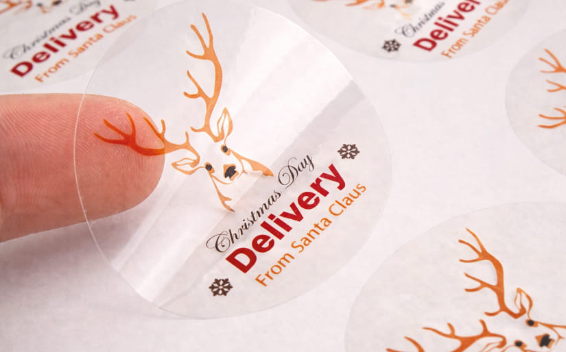 Печать наклеек на пленке для магазина подарков "Delivery from Santa Claus" по цене от 200 руб/м2, заказать дешево в Москве🔥